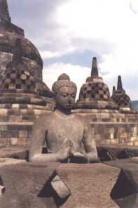 Buddha statue and stupas at Borobudur, courtesy: http://perso.club-internet.fr/pchanez/index_eng.html