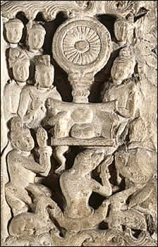 Dharmachakra carved in stone