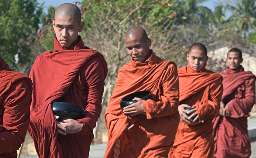 Burmese monks on the daily alms rounds - courtesy www.globalview.com